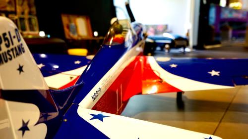 an american flag on the tail of a model airplane at Boutique Logis Hôtel Relais de Vincey in Vincey