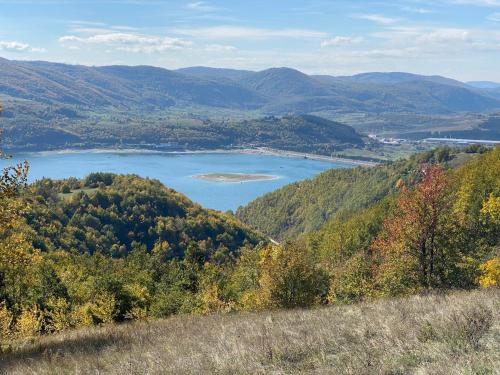 a view of a lake in the mountains at Zlatar Lake Hill in Nova Varoš
