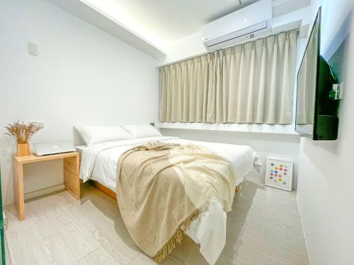 Postel nebo postele na pokoji v ubytování White Space Design Hotel