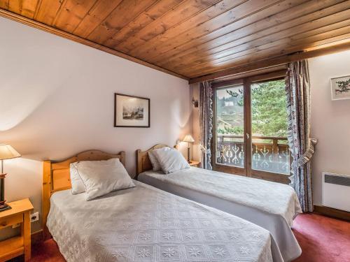 Photo de la galerie de l'établissement Appartement 2 chambres avec balcon, proche télécabine Jaillet et Palais Sports, garage, Wi-Fi, ascenseur - FR-1-453-45, à Megève