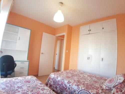 Postel nebo postele na pokoji v ubytování Apartamento Ángel