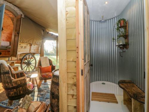 a view of a room with a tent at The Wagon at Burrow Hill in Ottery Saint Mary