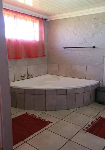 Bilik mandi di Perdehoek Venue