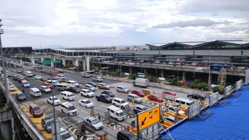 Imagen de la galería de Palm Tree Condos near MNL Airport Terminal 3 by ELR, en Manila