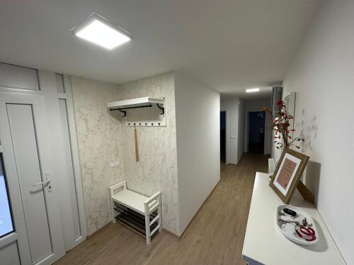 Televizors / izklaižu centrs naktsmītnē Apartma Luka