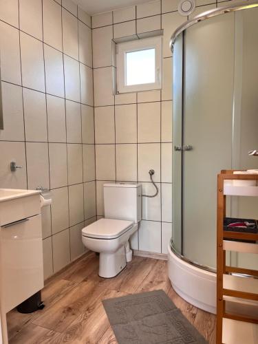 Vonios kambarys apgyvendinimo įstaigoje Domki całoroczne U Iwony