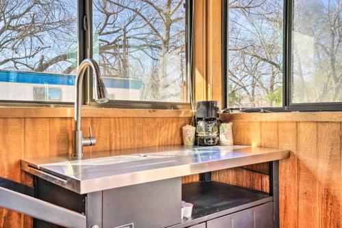 a kitchen with a sink and a window at Waterfront Studio with Fire Pit on Lake Dunlap! in New Braunfels