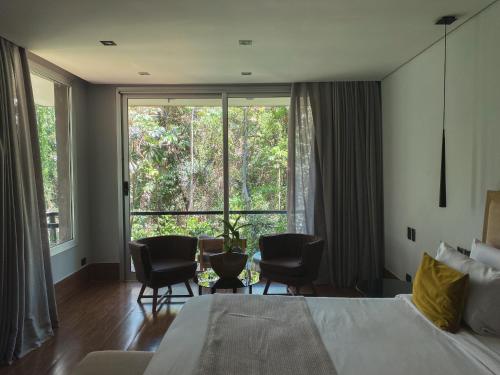 Letto o letti in una camera di Selvaje Lodge Iguazu