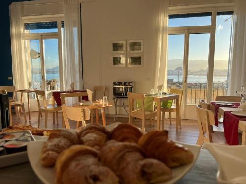 a plate of pastries on a table in a room at Garibaldi R&B in Messina