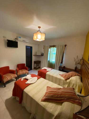 Postel nebo postele na pokoji v ubytování Hotel Complejo Najul Suites-Solo Adultos