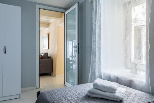 Кровать или кровати в номере Selini Lovely Apartment