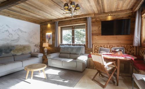 Un lugar para sentarse en Appartement Chalet Vall d Incles Résidence Deu Sol