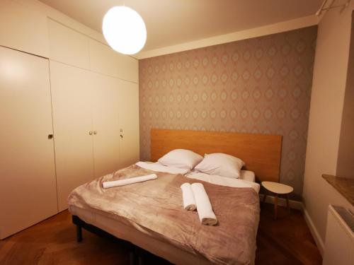 Postel nebo postele na pokoji v ubytování Apartament Central Park