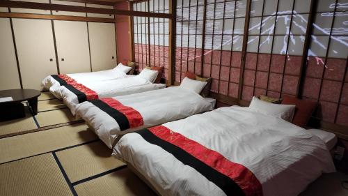 two beds sitting in a room with at Annex Kanazawa - Vacation STAY 31114v in Kanazawa