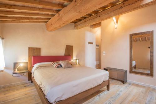 Letto o letti in una camera di Corte Formigar