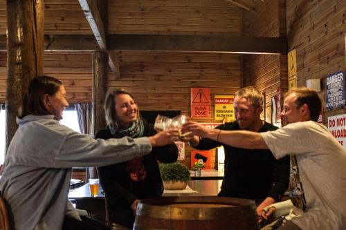 a group of people holding glasses of wine at Porters Lodge in Castle Hill