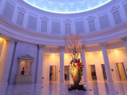 a large vase with flowers in the middle of a building at Shin Yokohama Prince Hotel in Yokohama