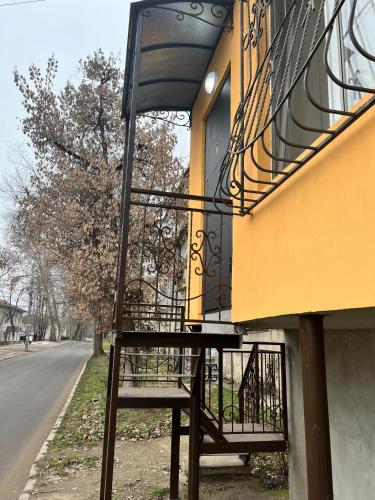 Orange House Next To a Park