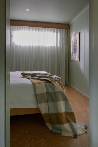 Letto o letti in una camera di River Drive Motel