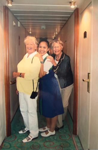 a group of three women standing in a hallway at Baansrisuthum in Don Sak