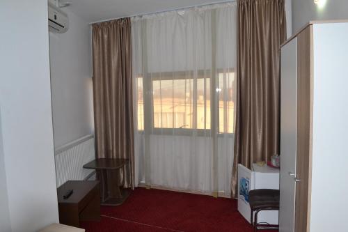 Televisyen dan/atau pusat hiburan di Live Tulcea Hotel