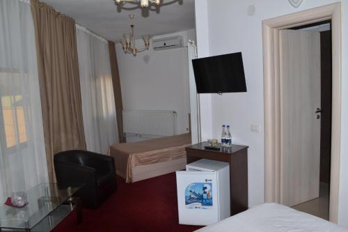 Televisyen dan/atau pusat hiburan di Live Tulcea Hotel