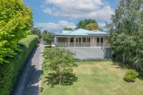 an aerial view of a house with a yard at Views On Montpellier in Healesville