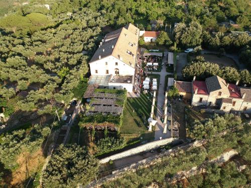 an aerial view of a large house with a yard at Relais Villa Giusso in Vico Equense