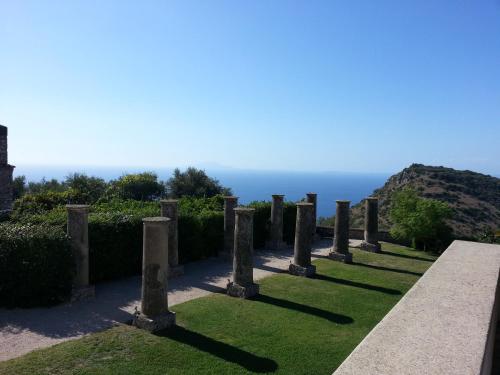 a cemetery with the ocean in the background at Relais Villa Giusso in Vico Equense