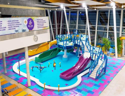 a water park with a slide and slides at Familly Apartmens in Dolní Dunajovice