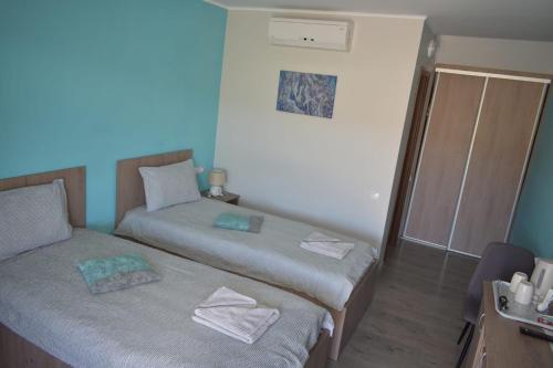 Postel nebo postele na pokoji v ubytování BBS Residence