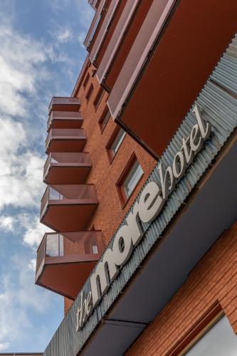 a sign on the side of a building at The More Hotel Västra Hamnen in Malmö