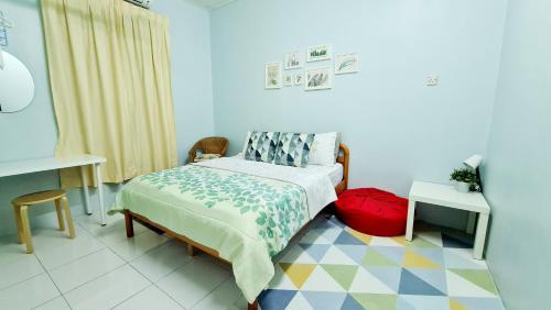 Кровать или кровати в номере EA Homestay Lembah Bujang Merbok