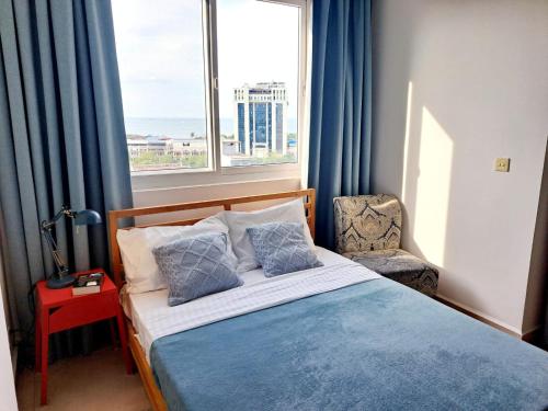 Voodi või voodid majutusasutuse Seaview Modern Studio toas
