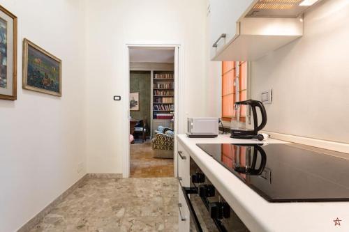 a kitchen with a sink and a counter top at Arena-Center Luxury Apartment in Verona