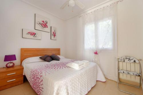 Postel nebo postele na pokoji v ubytování Mar Menor Golf Resort - 526