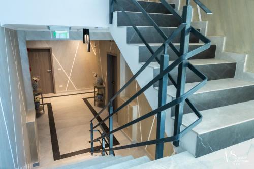 a view of a staircase in a house at Pensiunea AS in Floreşti