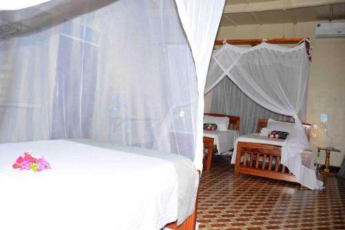 Ένα ή περισσότερα κρεβάτια σε δωμάτιο στο Meremeta Lodge