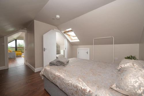 a bedroom with a large bed in a room at Blairmont View Point in Armagh
