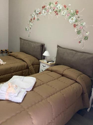 Postel nebo postele na pokoji v ubytování B&B Grazia