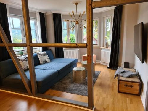 Posezení v ubytování Gruppenhaus mit Grillkota für 16 Personen in Hahnenklee