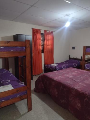 Katil atau katil-katil dalam bilik di Complejo de Departamentos DON QUIJOTE