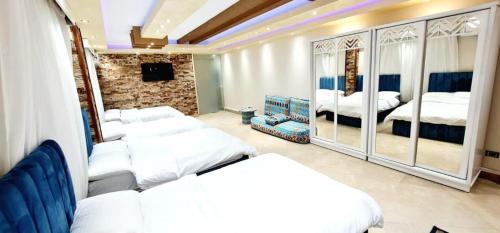 Villa 53 Luxury Suites – غرف فندقية