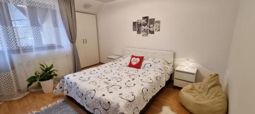 Un pat sau paturi într-o cameră la La Simo