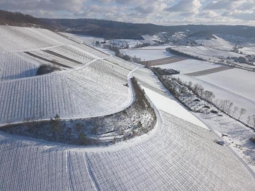 an aerial view of a snow covered race track at Gästehaus Winzerhof am Schlierbach in Weiler bei Weinsberg