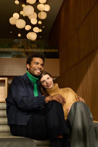 a man and a woman posing for a picture at Hyatt Place Montreal - Downtown in Montréal