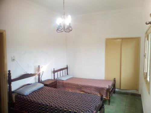 Un pat sau paturi într-o cameră la Los Médanos