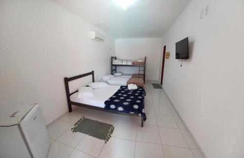 Postel nebo postele na pokoji v ubytování Manitu Flat Canoa Quebrada