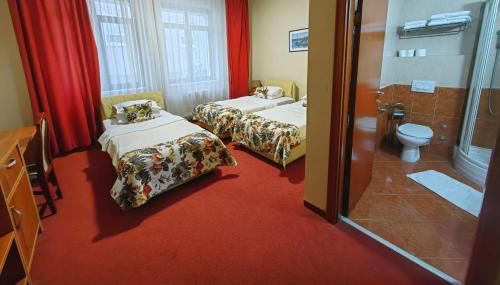 Postel nebo postele na pokoji v ubytování Hotel N