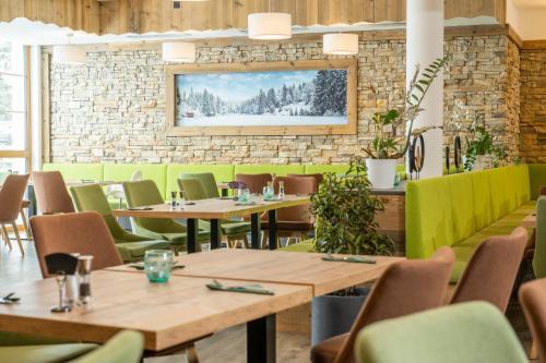 Ресторан / й інші заклади харчування у Hotel Alpendorf Ski- & Sonnenresort by AlpenTravel